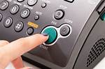 Button on a Fax Machine