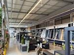 Chain Store Whose Sections Include Showroom and Marketplace