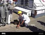 Deck-Swabbing Implement