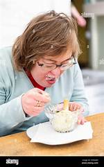___ Down (Begin Eating)