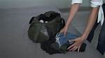 Fills a Suitcase