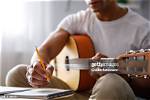 Is Composing a Song?