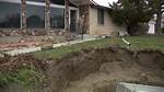 Massive Sinkhole Opens in Sandy Neighborhood, Swallows Resident's Yard