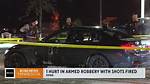 Shots Fired During Armed Robbery at Indoor Swap Meet, Grazing Employee