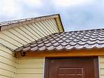 Should Siding Touch Shingles?