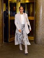 Tia Mowry Wore an All-Gray Outfit Accessorized with Hair Shells—See Pics