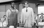 When Does Atticus Defend Tom?