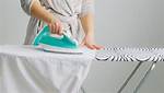 When Ironing Clothes the Primary Method of Heat Transfer Is