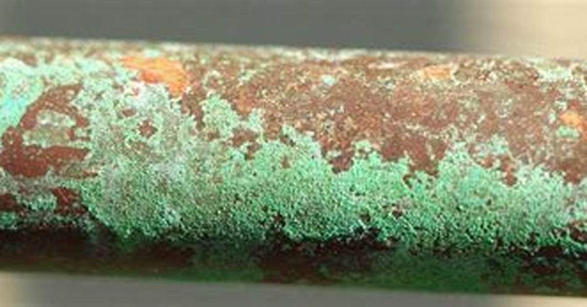 Why Copper Develops Greenish Layer?