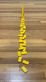 Why Do Dominoes Fall